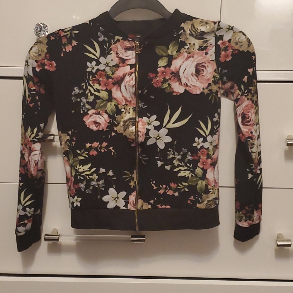 Floral girl's zip up jacket.